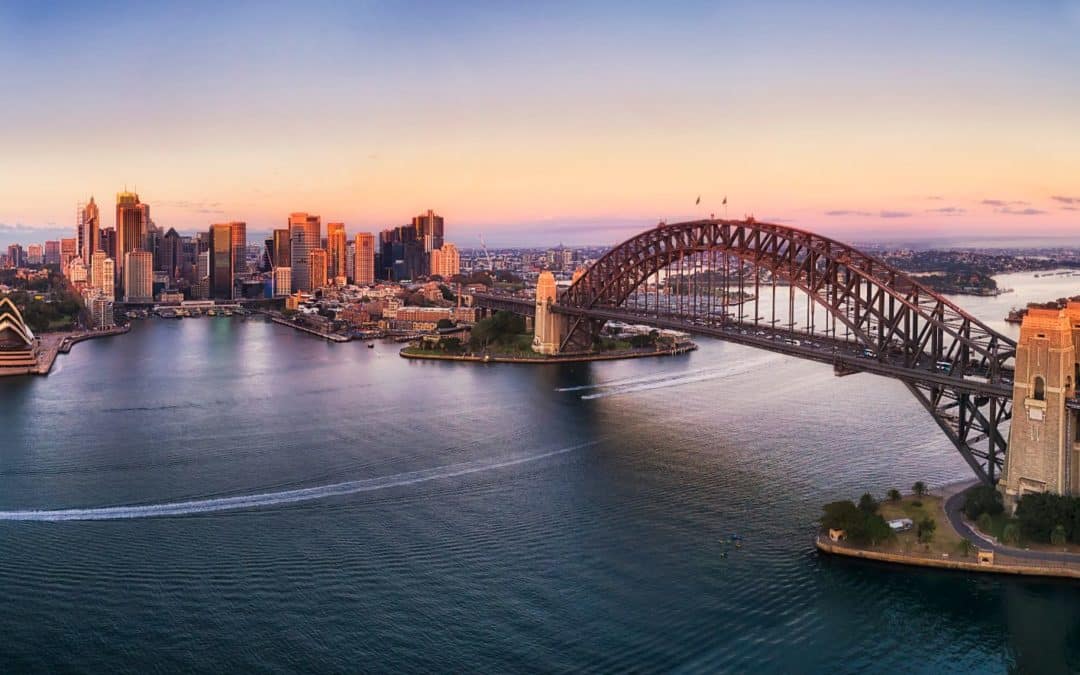 The sydney harbour bridge at sunset